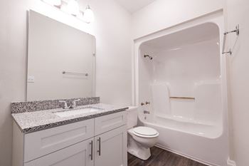 Large soaking tub with tile backslash